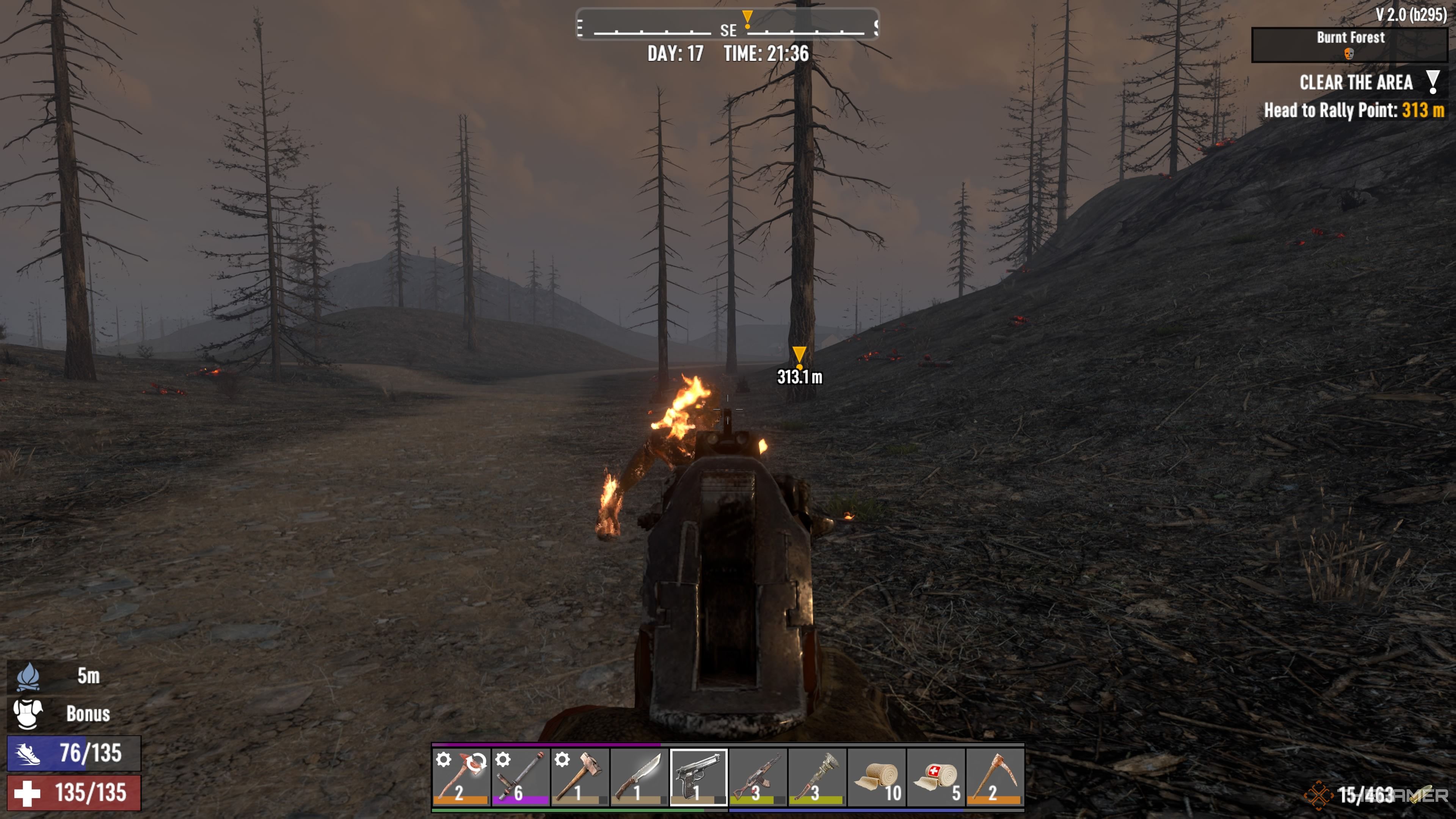Player character aiming a pistol at a flaming zombie in the Burnt Forest in 7 Days To Die.