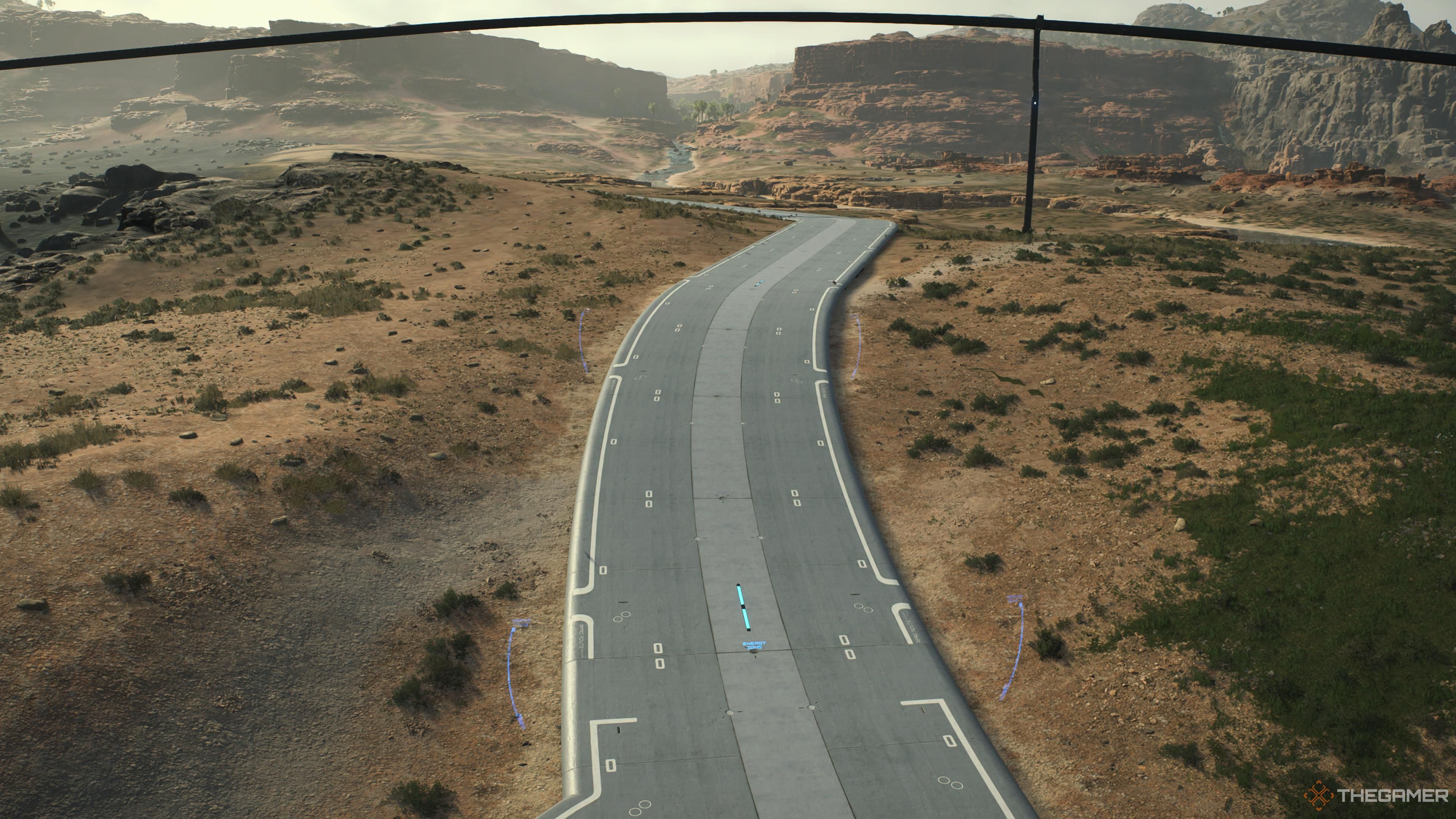 A completed road in death stranding 2: on the beach.