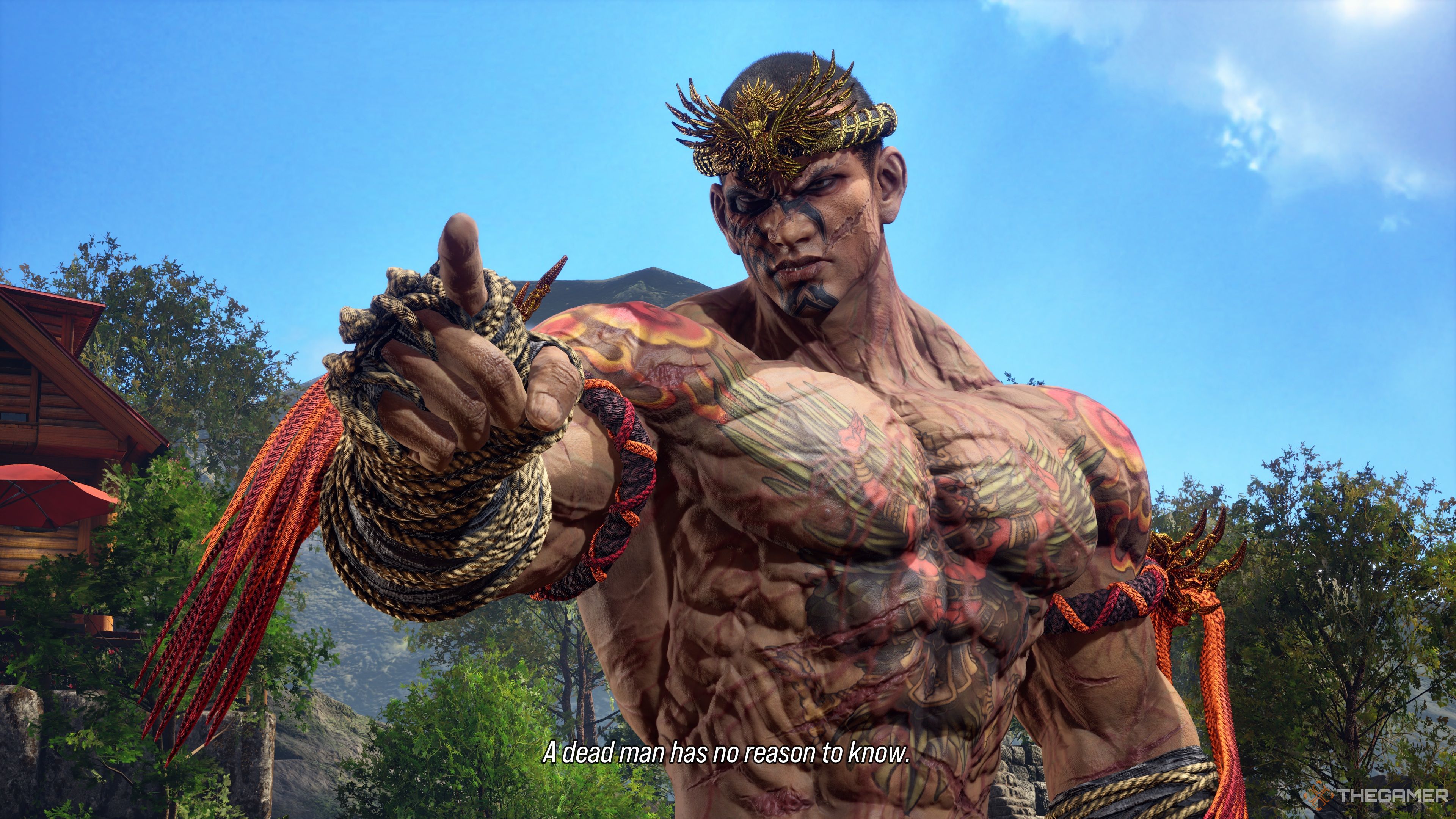 Fahkumram pointing while saying 'A dead man has no reason to know,' before squaring off against his opponent in Tekken 8.