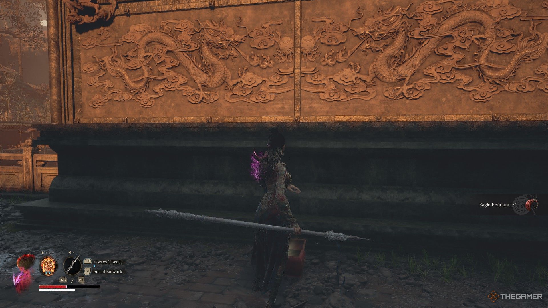 Wuchang finds the Eagle Pendant from a chest in the Tang Emperor's Palace in Wuchang: Fallen Feathers.