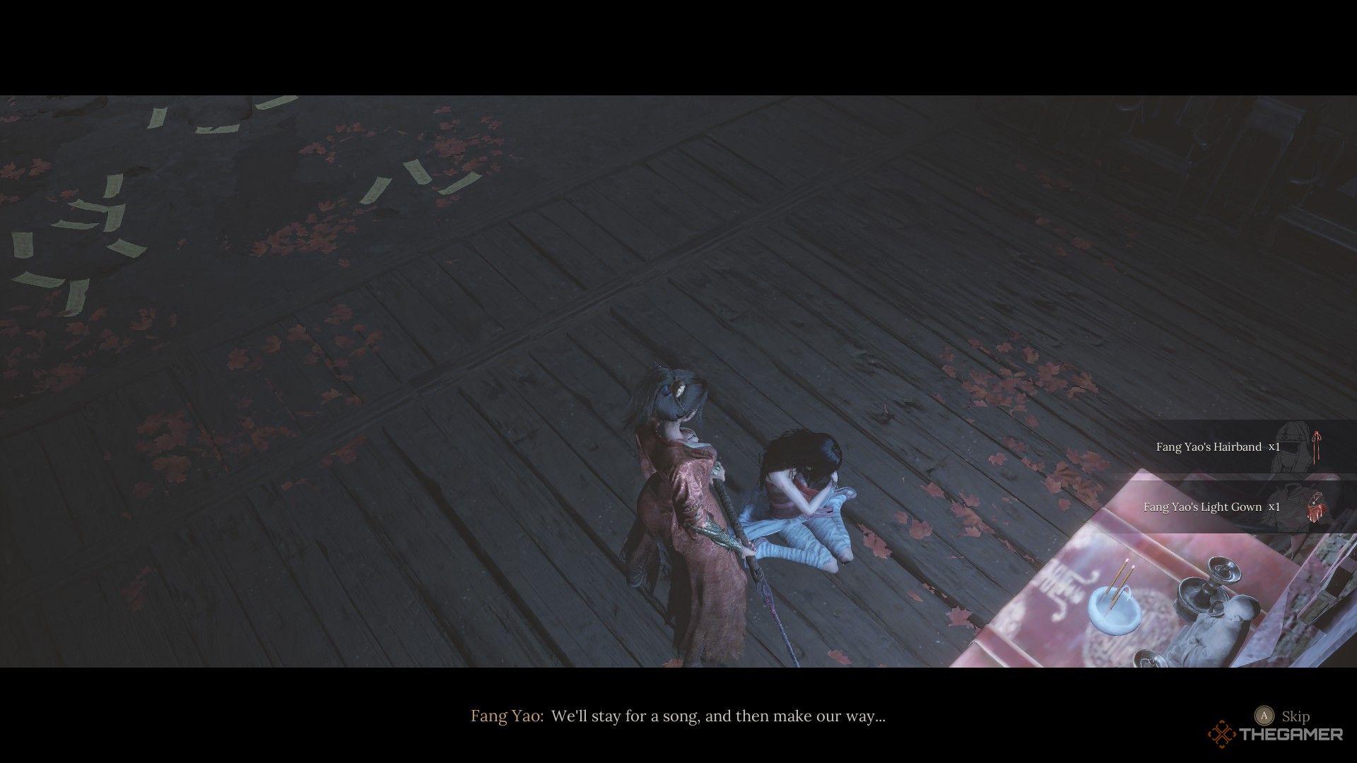 Fang Yao cradles the head of Fang Ling and gives Fang Ling's outfit to Wuchang in Wuchang: Fallen Feathers.