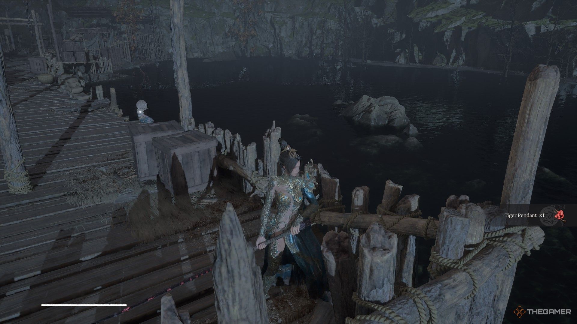 Wuchang finds the Tiger Pendant at the end of the Ferry Overlook Docks in Wuchang: Fallen Feathers.
