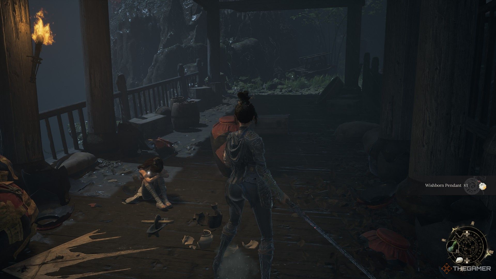 Wuchang picks up the Wishborn Pendant next to Fang Yao in Wuchang: Fallen Feathers.