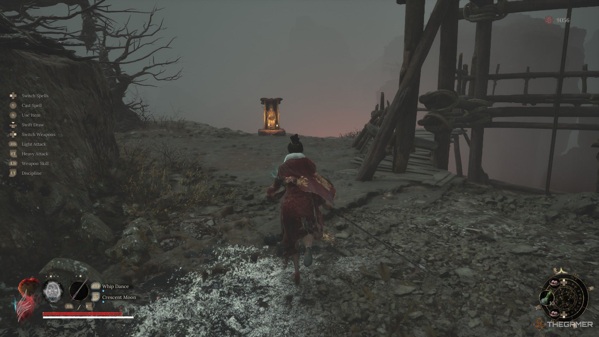 Wuchang runs toward the Lu Mansion shrine beside an elevator at Doomwillow Beach in Wuchang: Fallen Feathers.