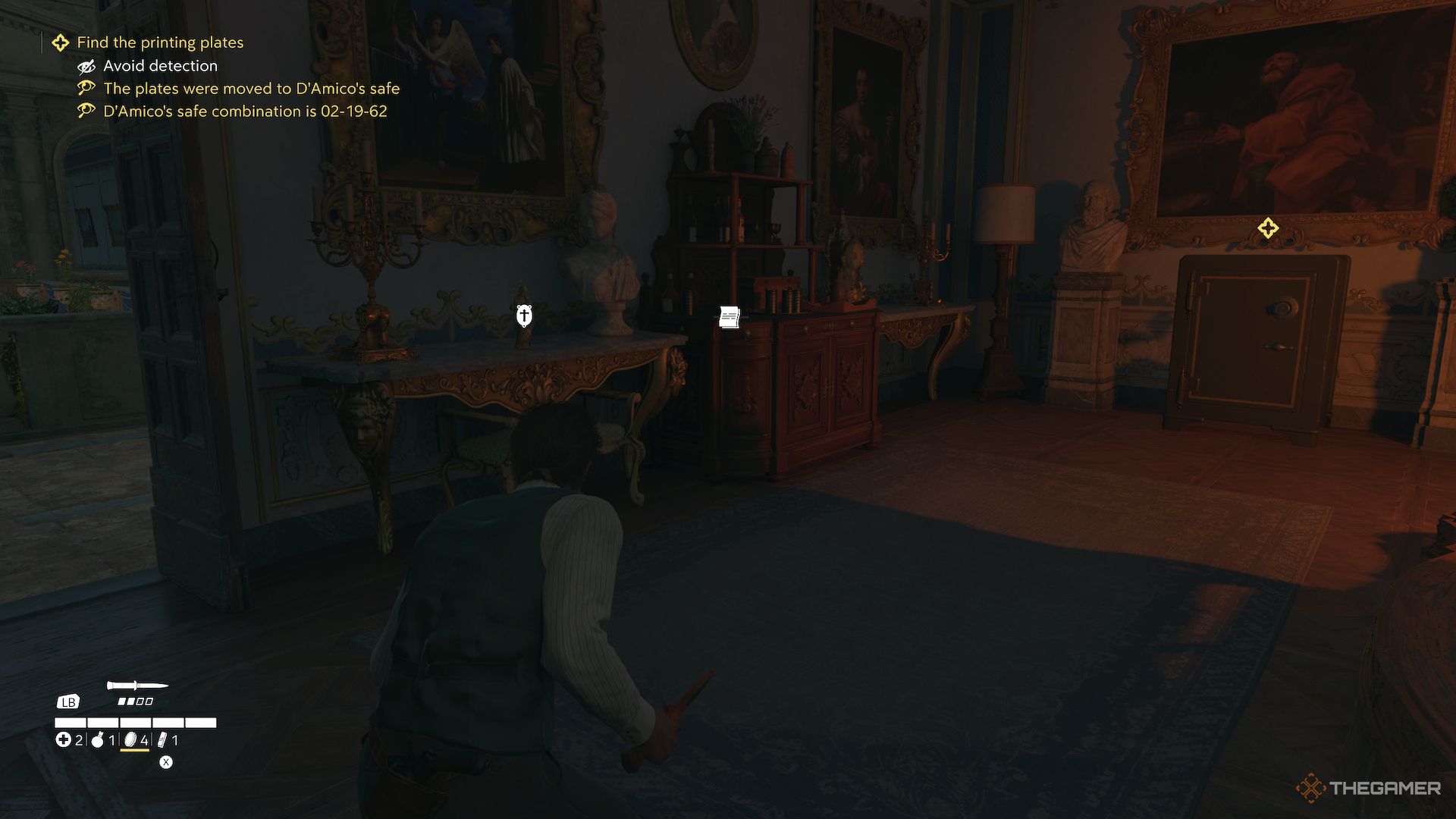 A charm between a bust and candle in D'Amico's Office in Mafia The Old Country.