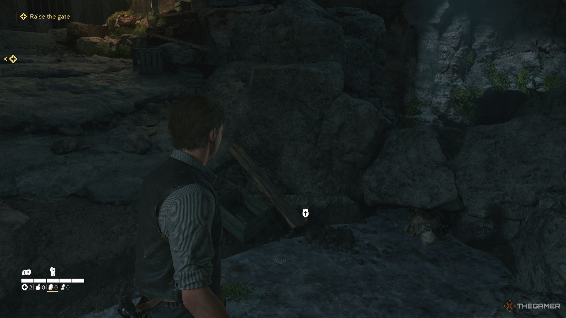 A charm next to a box and a skeleton in Mafia The Old Country.