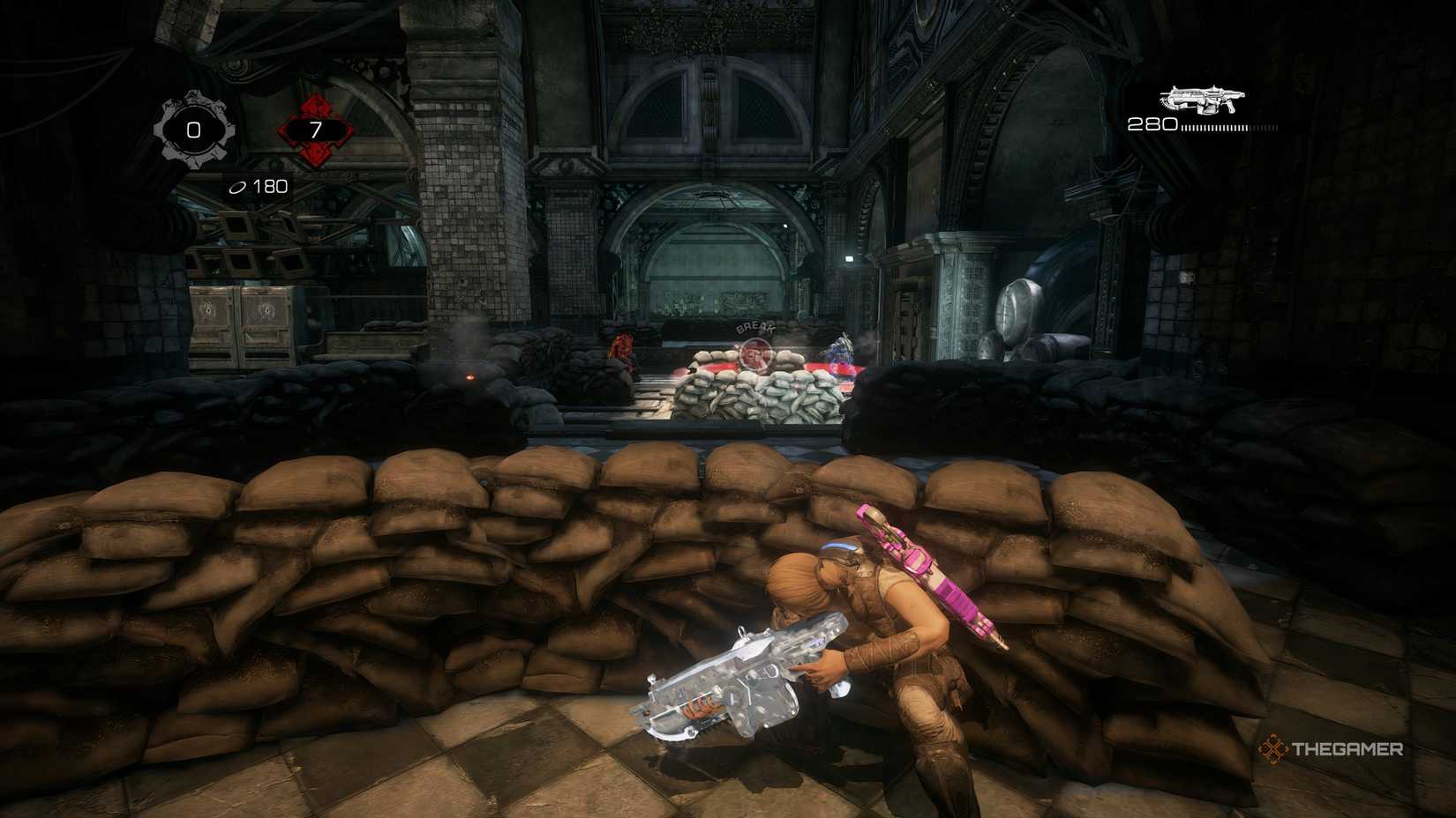 The player behind cover while two enemy players control a point in front in Gears of War: Reloaded. 
