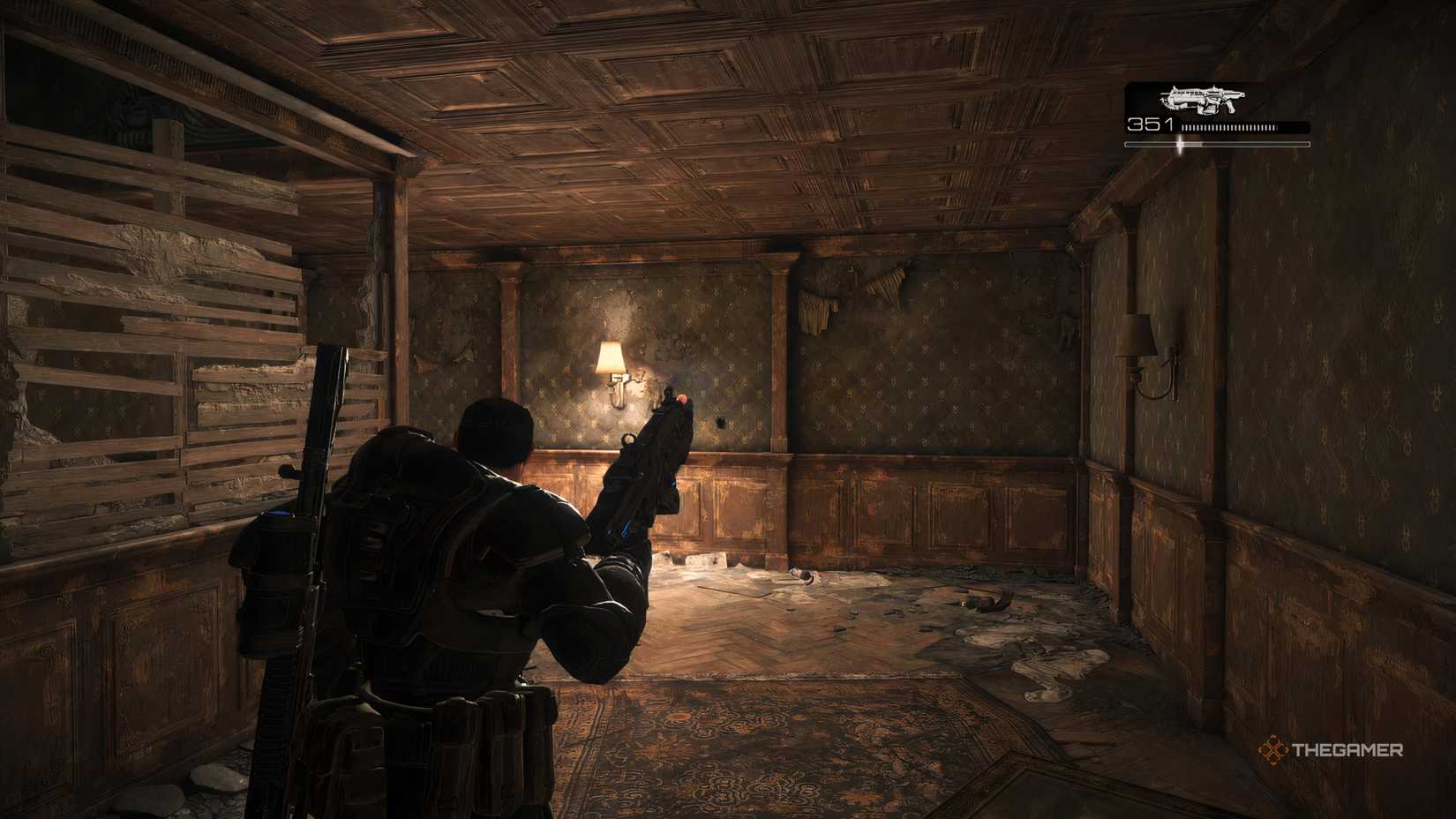 Marcus performing an active reload in Gears of War: Reloaded.