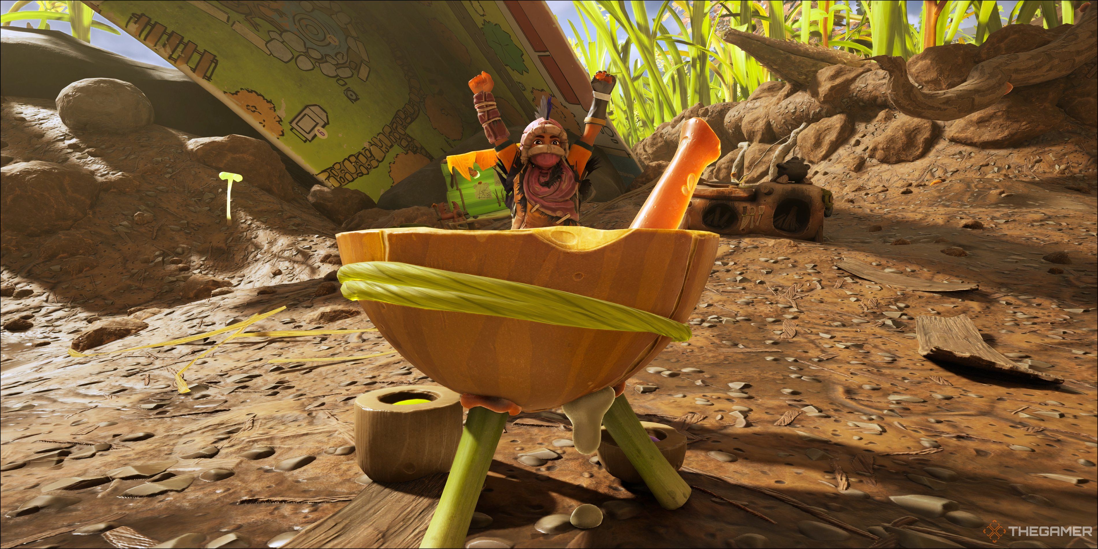 Max cheering in front of a Smoothie Station in Grounded 2.