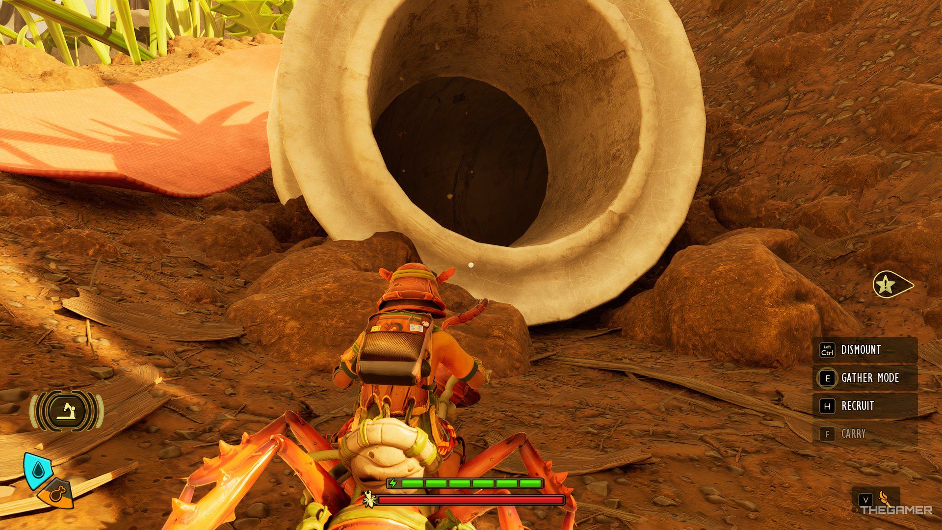 The player on their Red Solider Ant buggy looking at an entrance of a tunnel in Grounded 2.