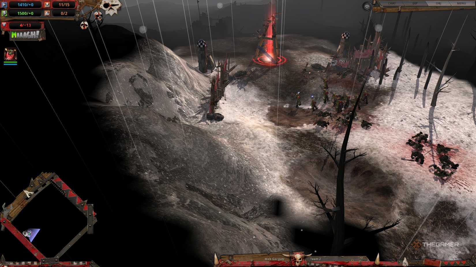 The Ork race in Warhammer 40K: Dawn of War - Definitive Edition attacking an enemy base.