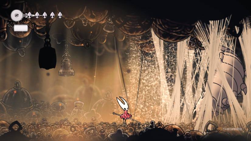 Hornet finds the Bell Beast strung up in silks in Hollow Knight: Silksong.