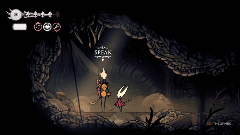 Hornet finds Shakra in the Wormways in Hollow Knight: Silksong.