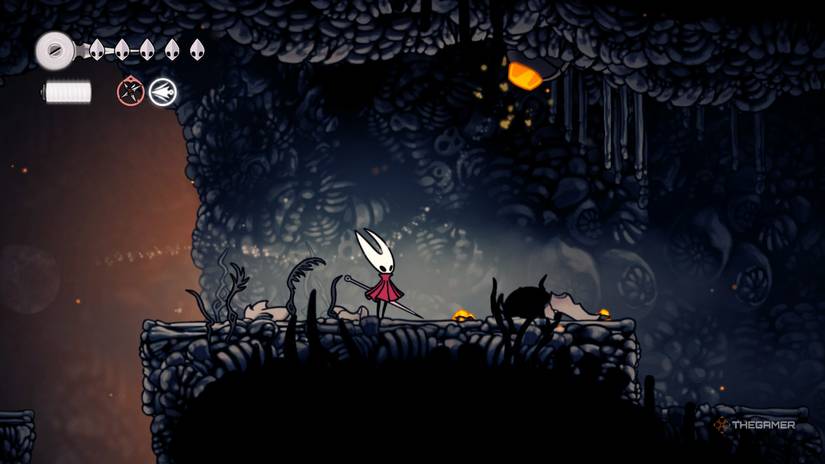 Hornet tracks the second Flintstone Beetle to its location in the ceiling in Hollow Knight: Silksong.