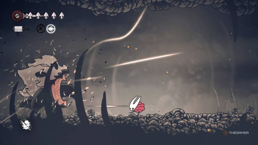 Hornet uses Silkspear to defeat the Skull Tyrant in Hollow Knight: Silksong.