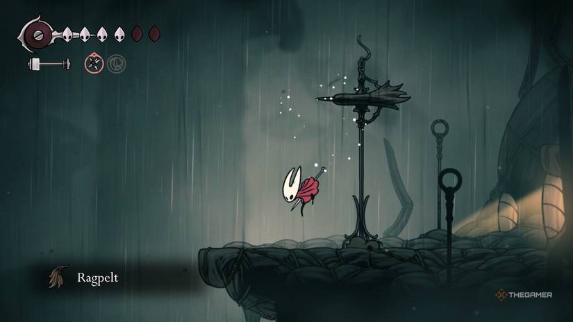 Hornet falls from the air after gathering a ragpelt from a defeated craw in Hollow Knight: Silksong.