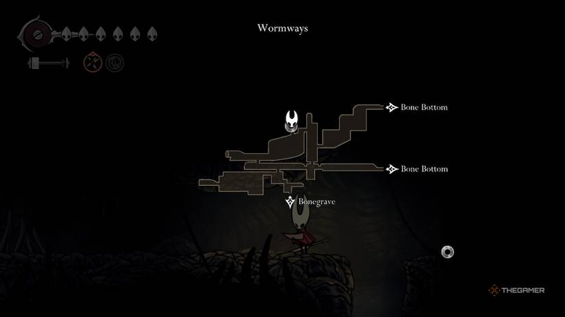 Hornet looks on her map at the Alchemist's location in the Wormways in Hollow Knight: Silksong.