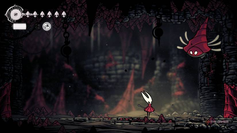 A great conchfly prepares to fire a conch shell at Hornet in Hollow Knight: Silksong.