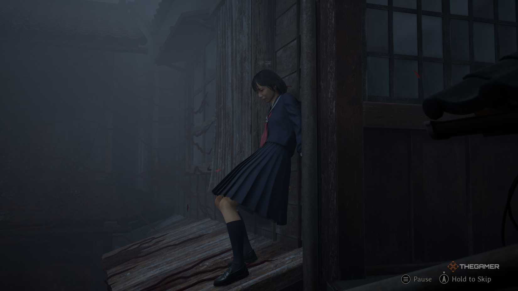 Hinako moving across a rooftop in Silent Hill f.