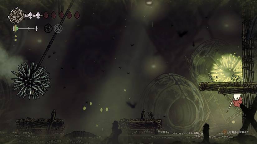Hornet hides under a corner as a trap swings across Groal's arena in Hollow Knight: Silksong.