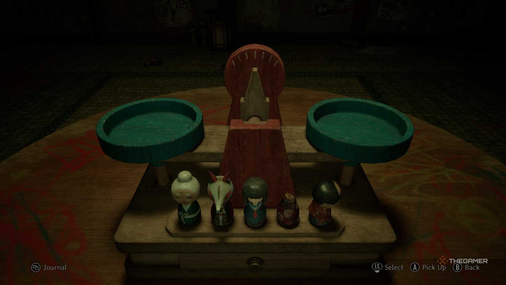 A scales with multiple weighted dolls in silent hill f.