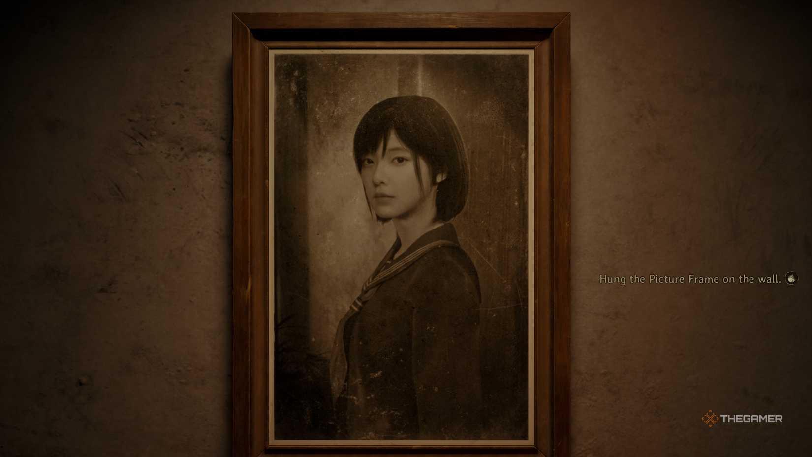 A framed sepia photo of Hinako in Silent Hill f.
