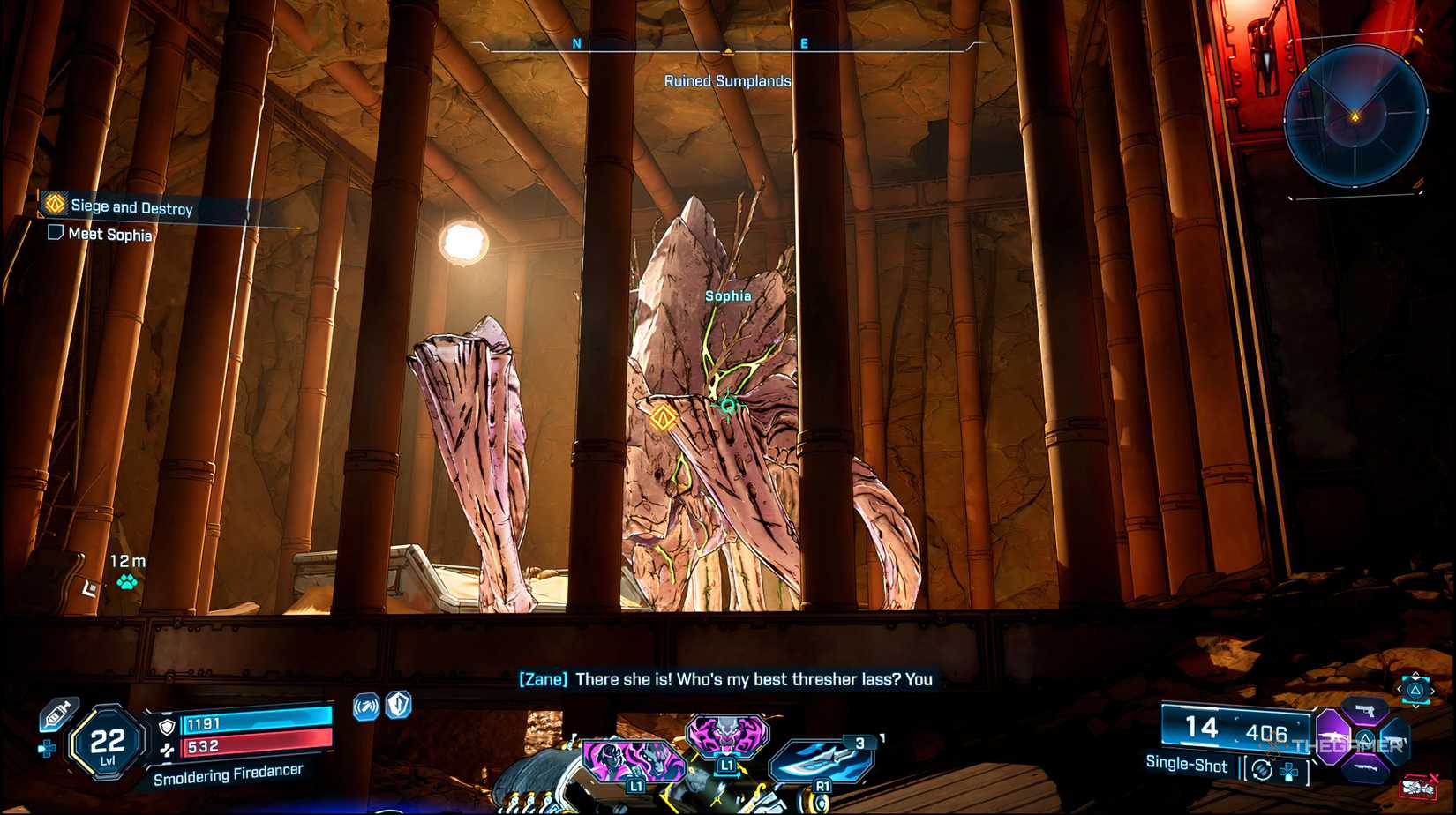 The player in the Pit looking at Sophia who is a Thresher in her cage in Borderlands 4.