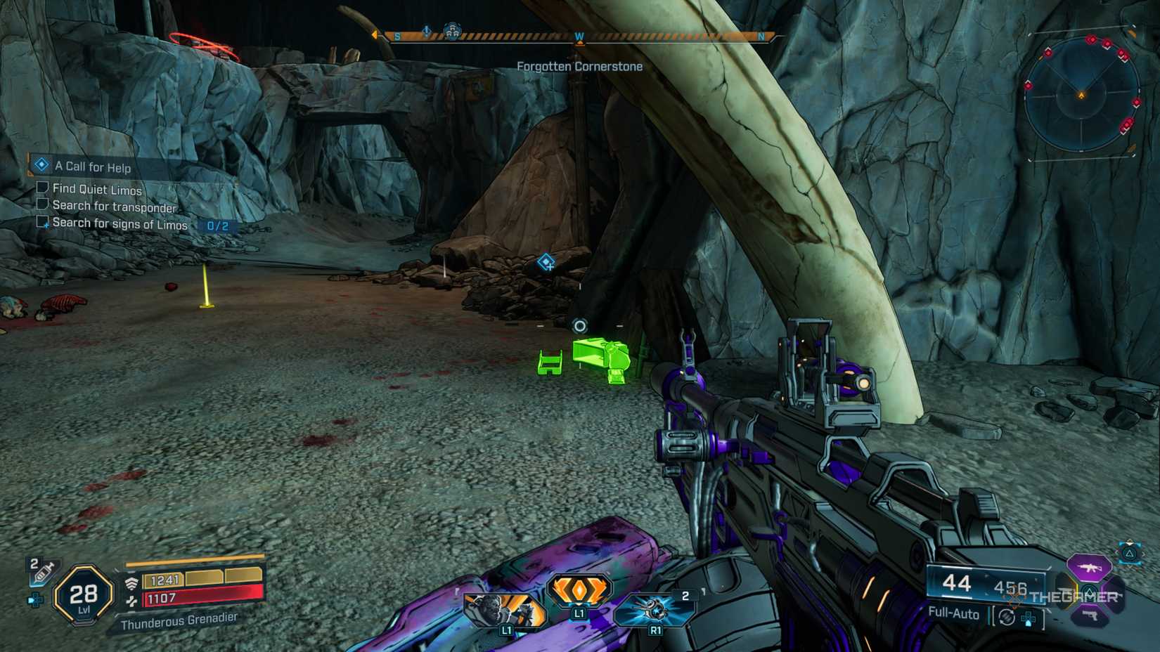 Amon looking at several highlighted items sitting beneath a rib bone in a cavern in Borderlands 4.