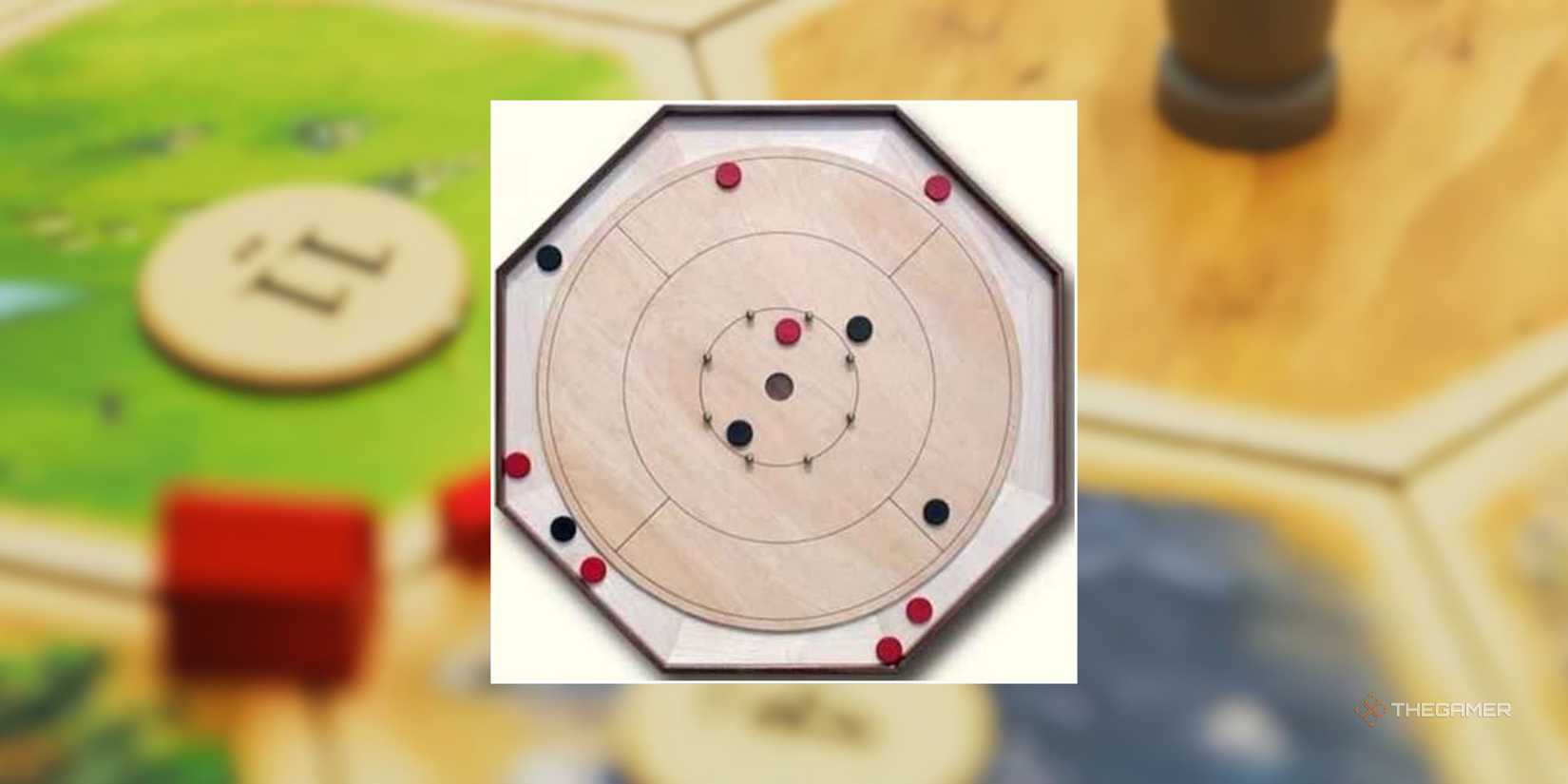 Crokinole in front of a blurred image of a Catan board.
