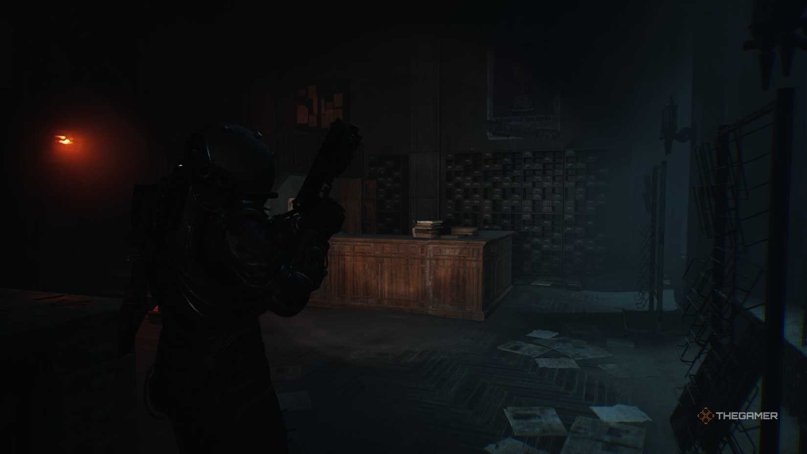 The Traveler looking at a desk with an archive in Cronos: The New Dawn.