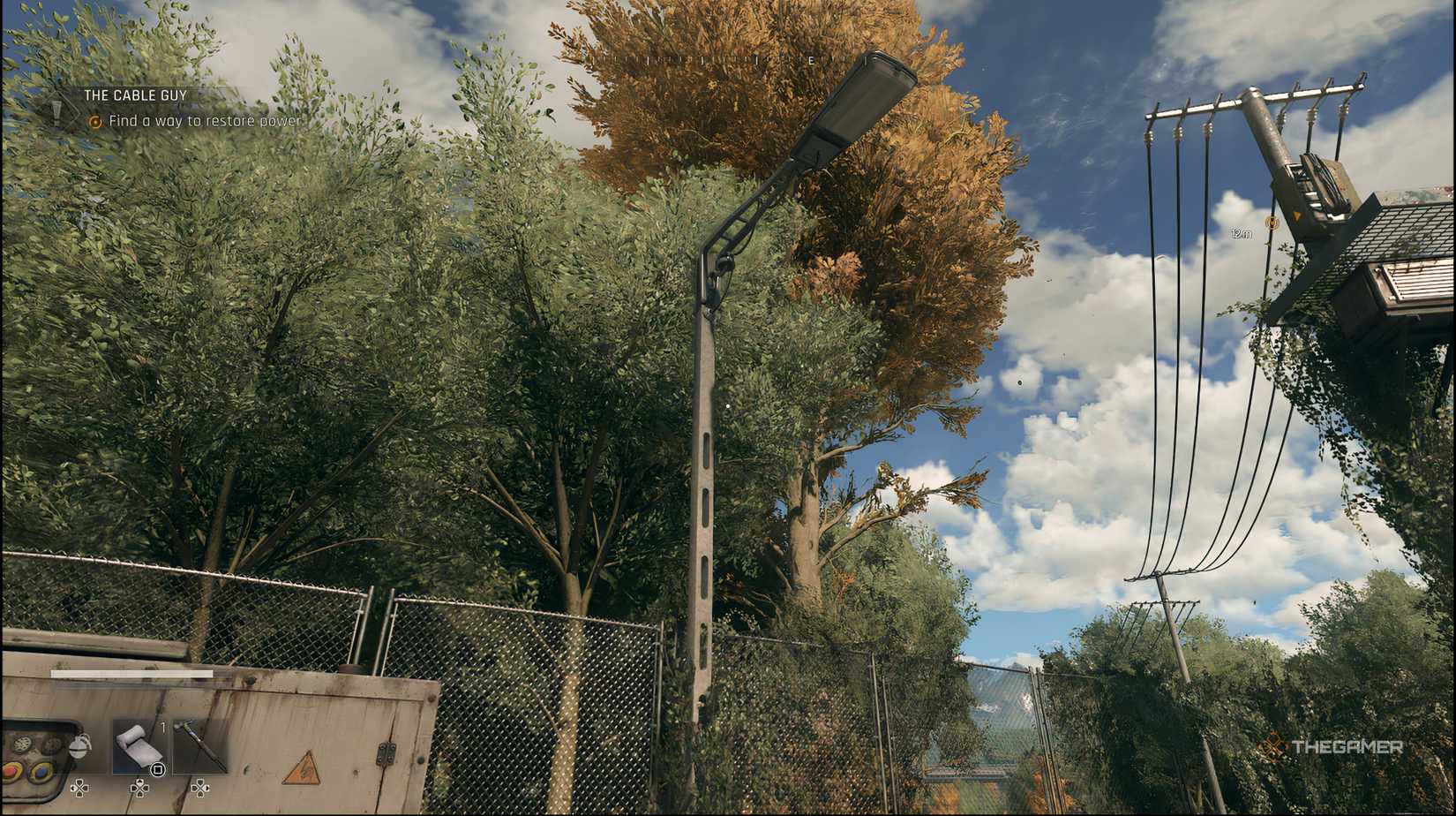 The player standing under a light post in Dying Light: The Beast.