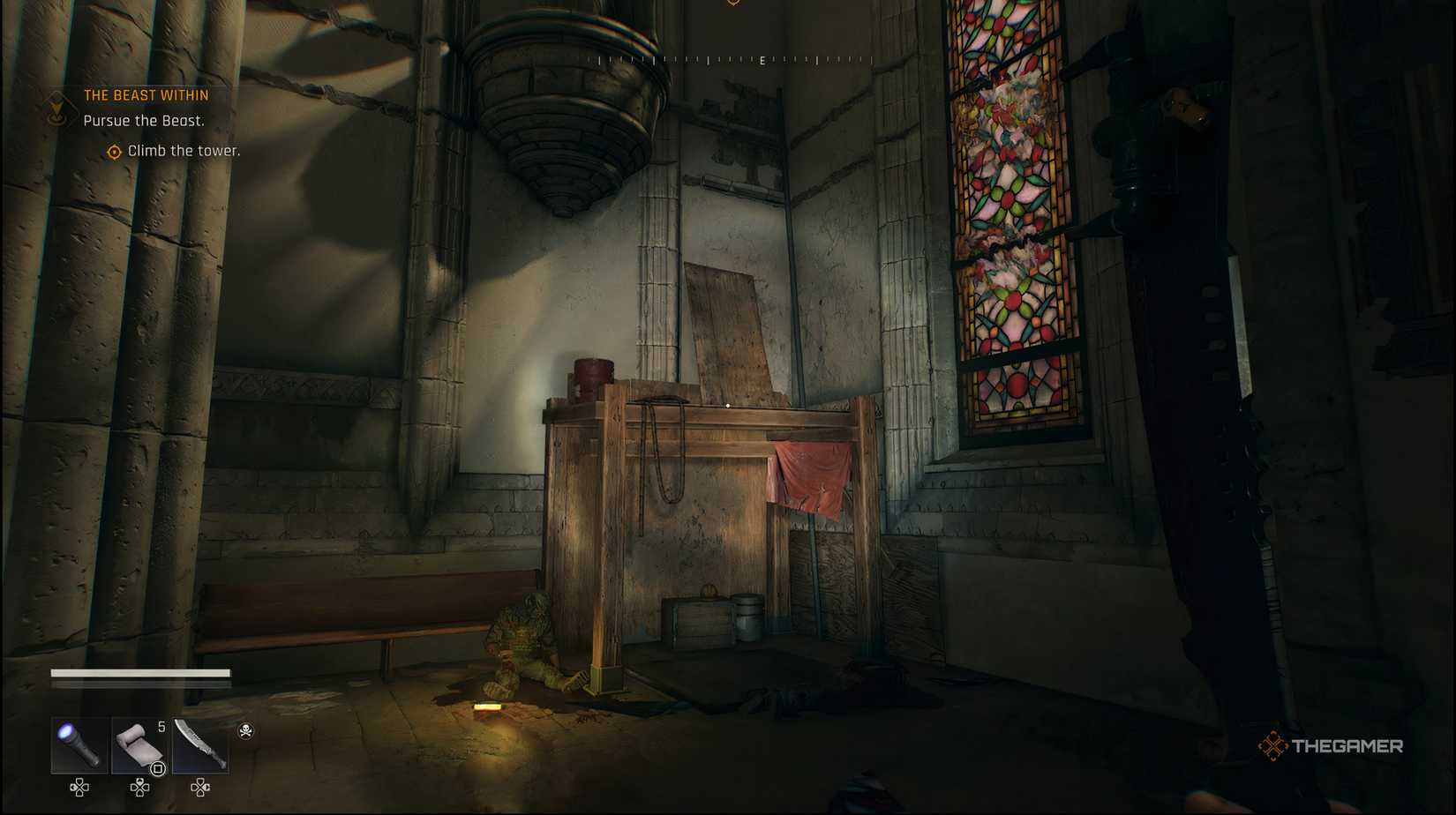 The player looking a wooden platform with a body on the left of it in Dying Light: The Beast.