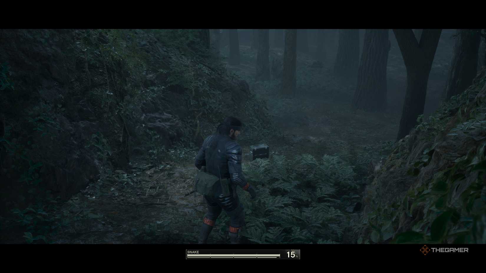 Snake near an animal in a box that has been caught by a mousetrap in Metal Gear Solid Delta: Snake Eater.
