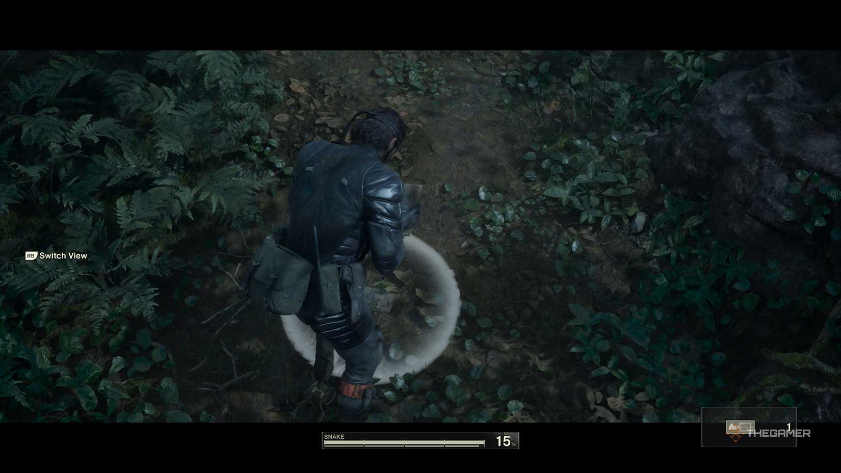 Snake placing down a mousetrap in Metal Gear Solid Delta: Snake Eater.