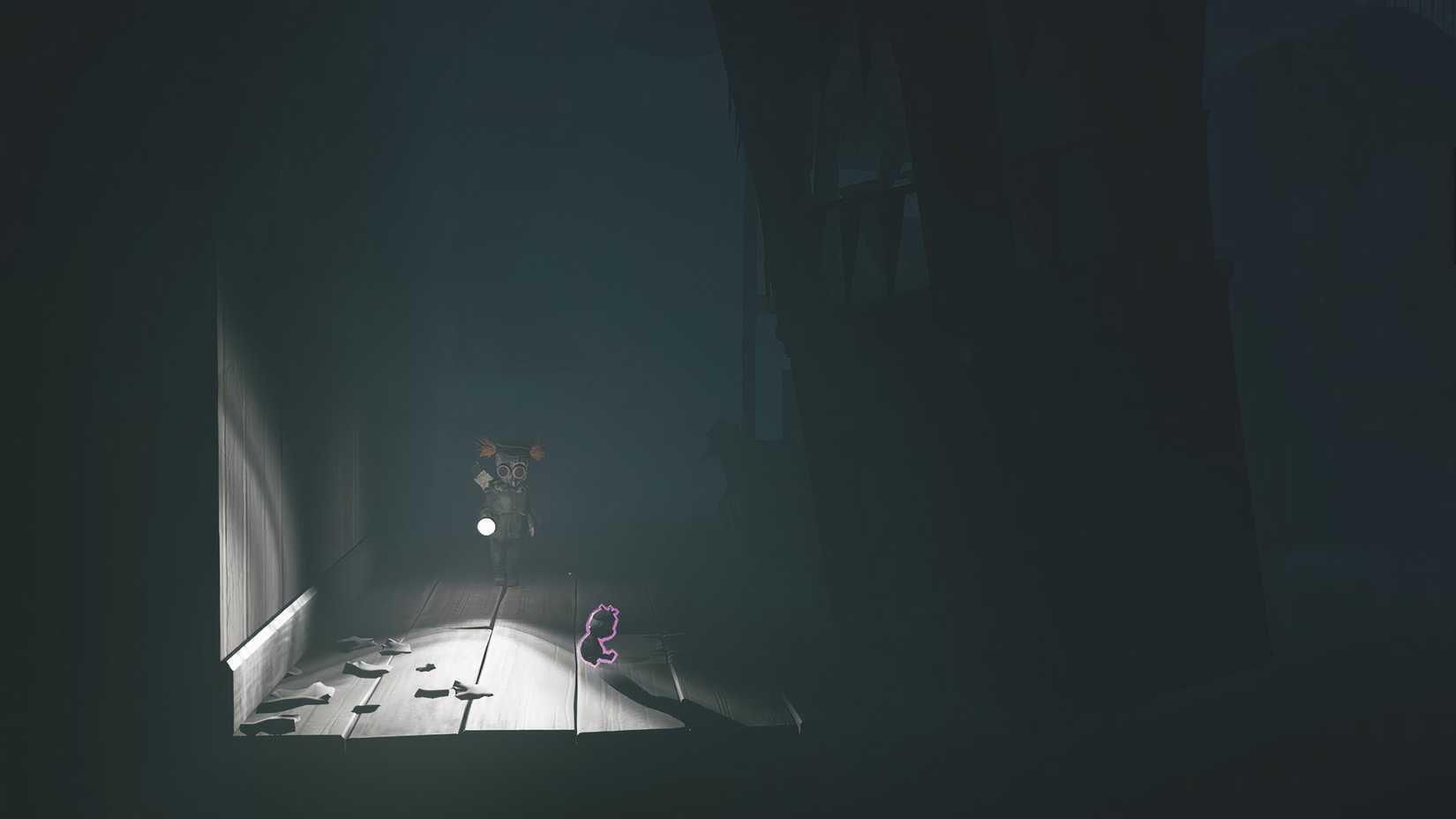 Alone collecting a small doll sitting on the floor in a dark corner in Little Nightmares 3.