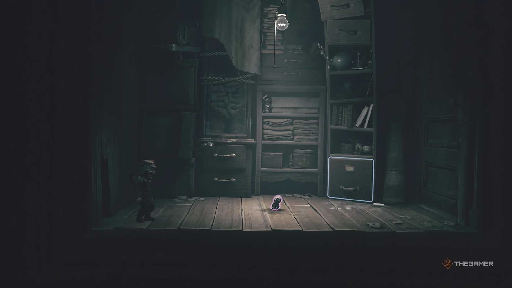 Alone collecting a doll in a small room in Little Nightmares 3.