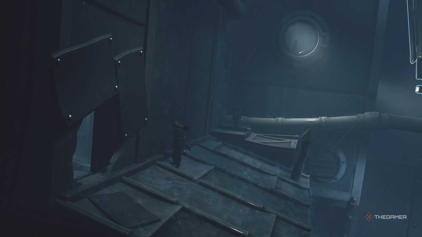 Alone standing on a roof next to an opening in Little Nightmares 3.