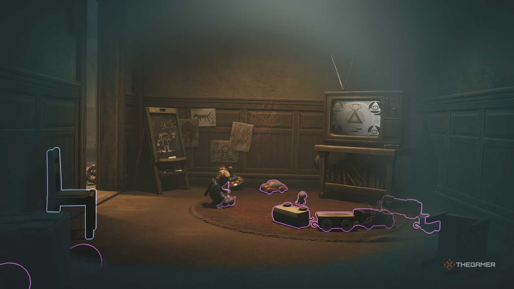 Alone standing in a bright room with a doll and some toys on the floor in Little Nightmares 3.