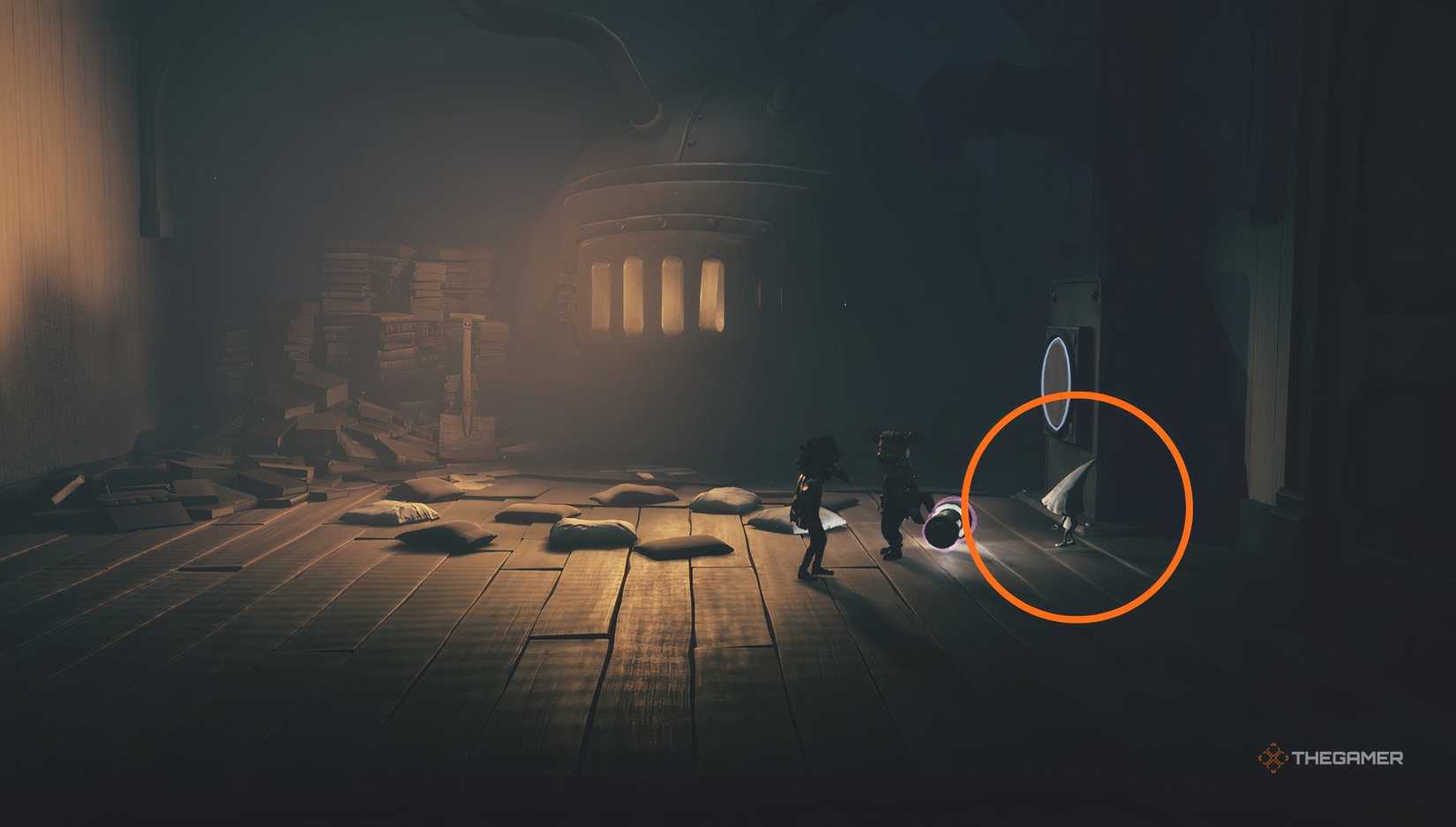 A Nome running out with a battery in a room with a furnace in Little Nightmares 3.