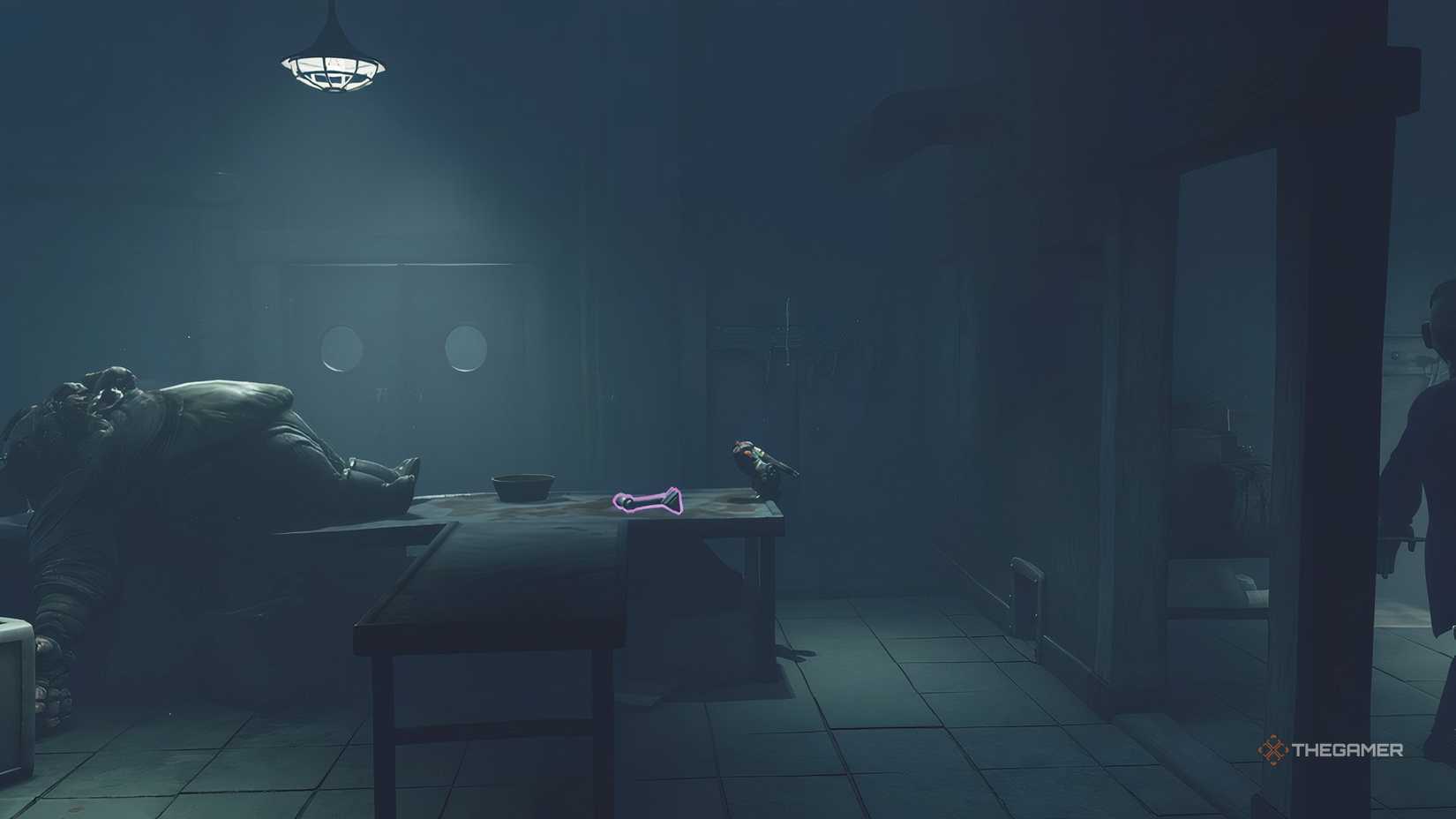 Alone climbing on a table to reach a lever in Little Nightmares 3.