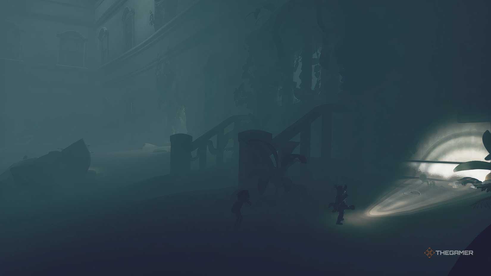 Alone pointing a light at a ghost drawing in the sand in Little Nightmares 3.