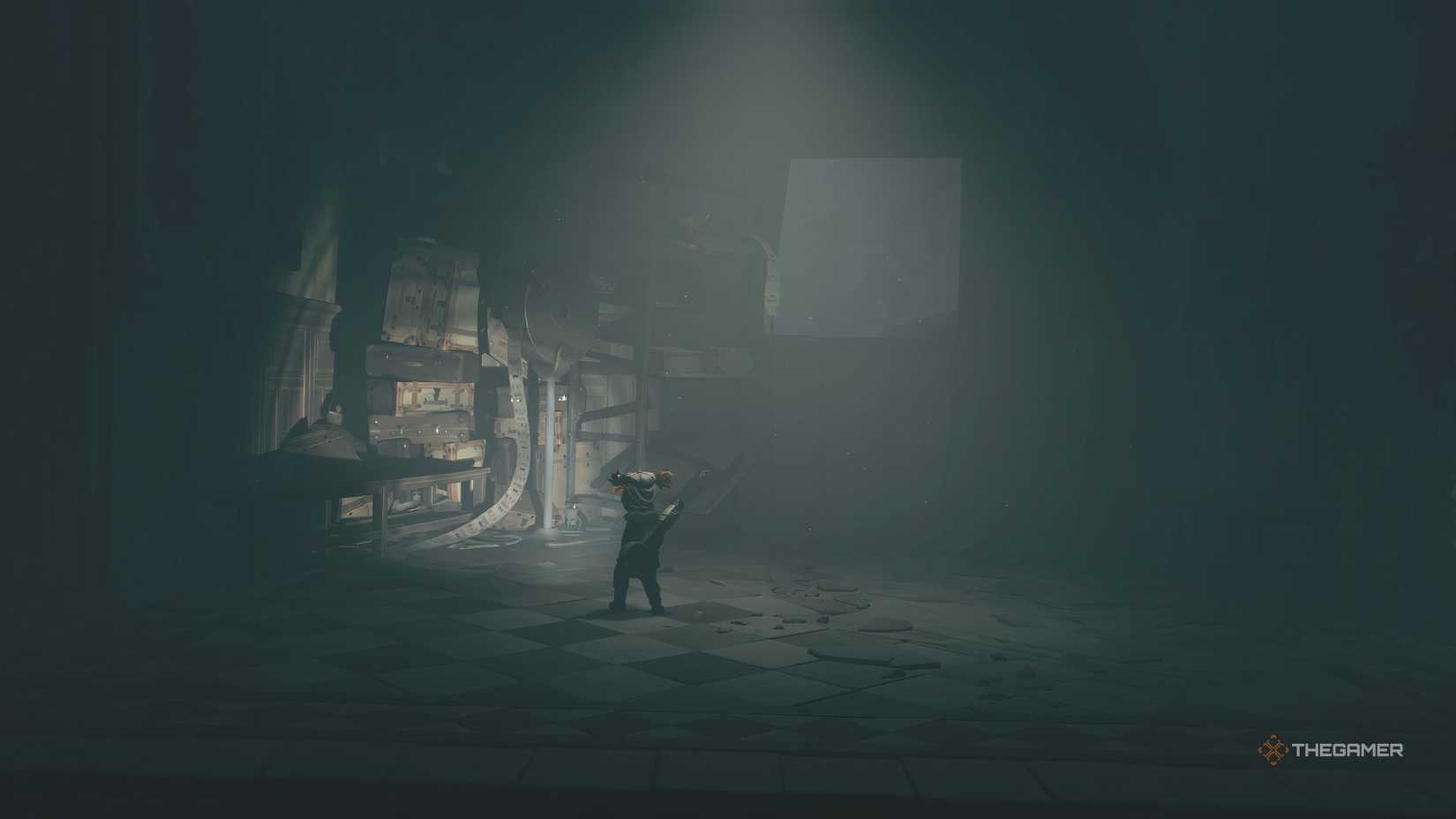 Alone shining her light on a bench in Little Nightmares 3.