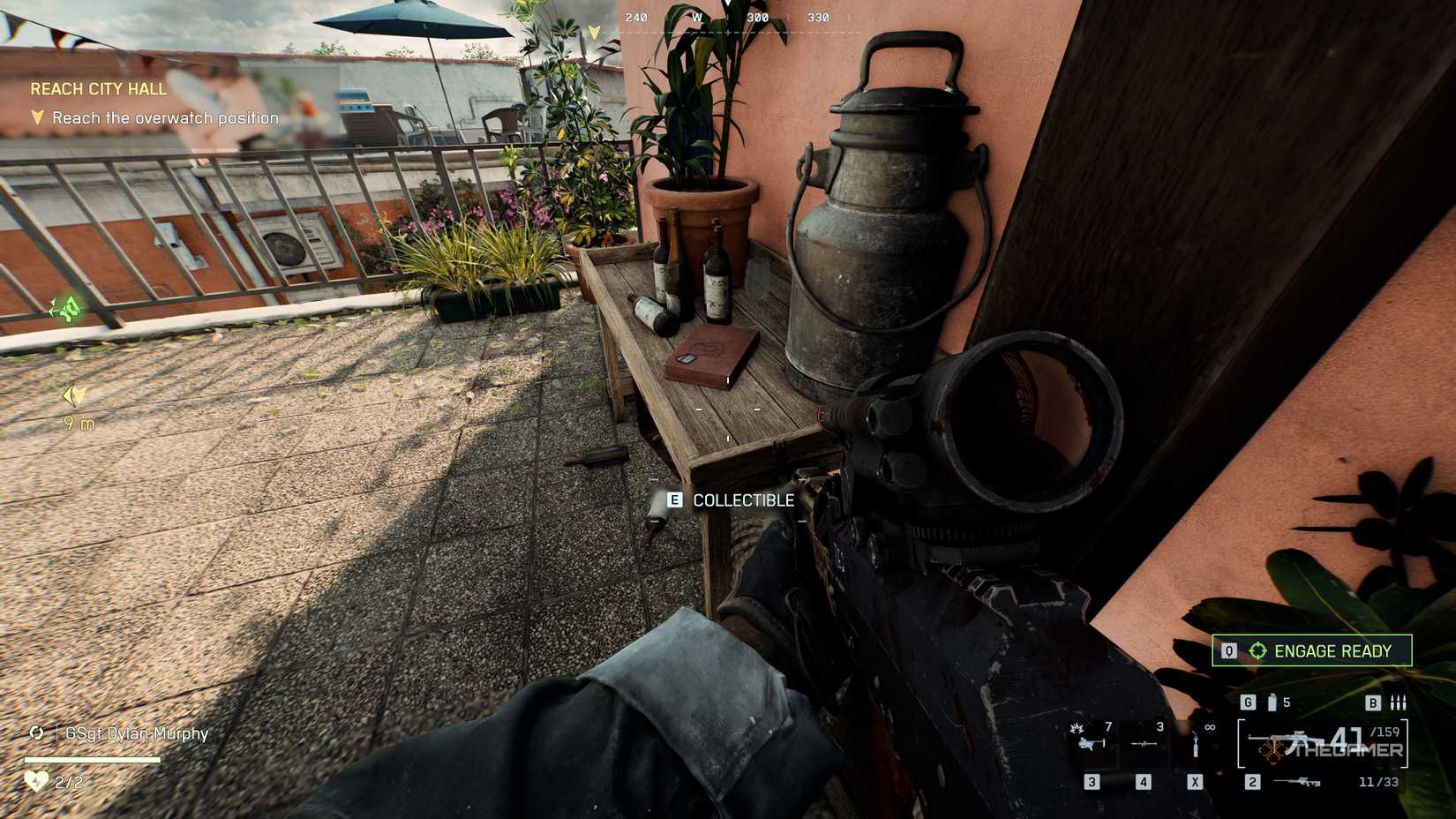 Battlefield 6 player looking at a pair of dog tags on a table, on top of a book.