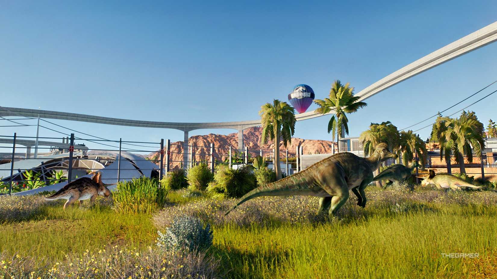 Jurassic World Evolution 3 - dinosaurs and balloon tour in the background.
