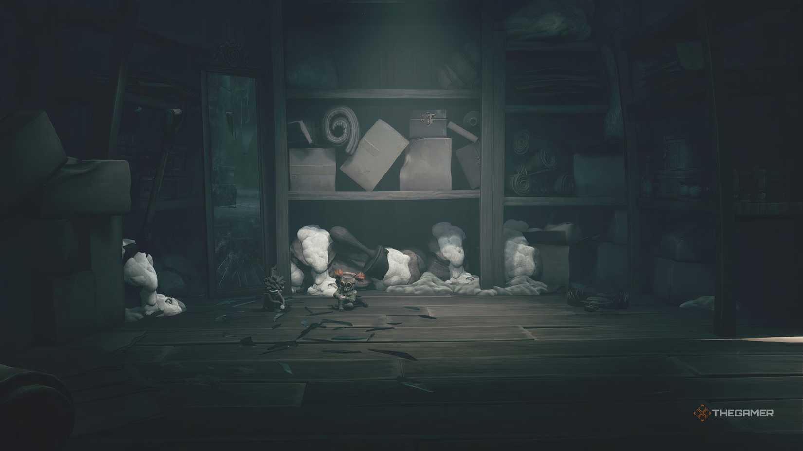 Low and Alone sitting on the floor next to a mirror in Little Nightmares 3.