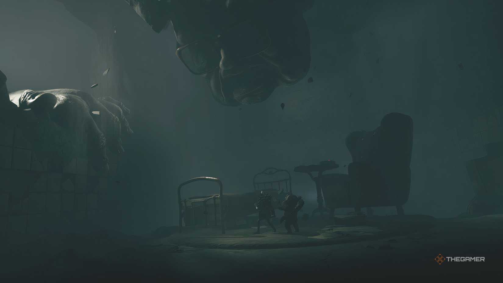 Low and Alone standing under a man's face in Little Nightmares 3.