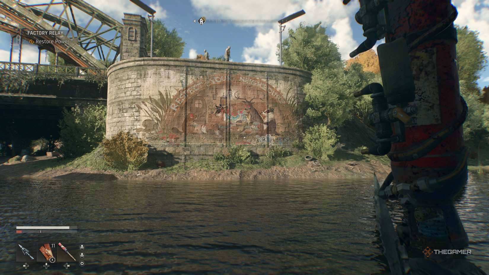 Dying Light: The Beast mural by a river.