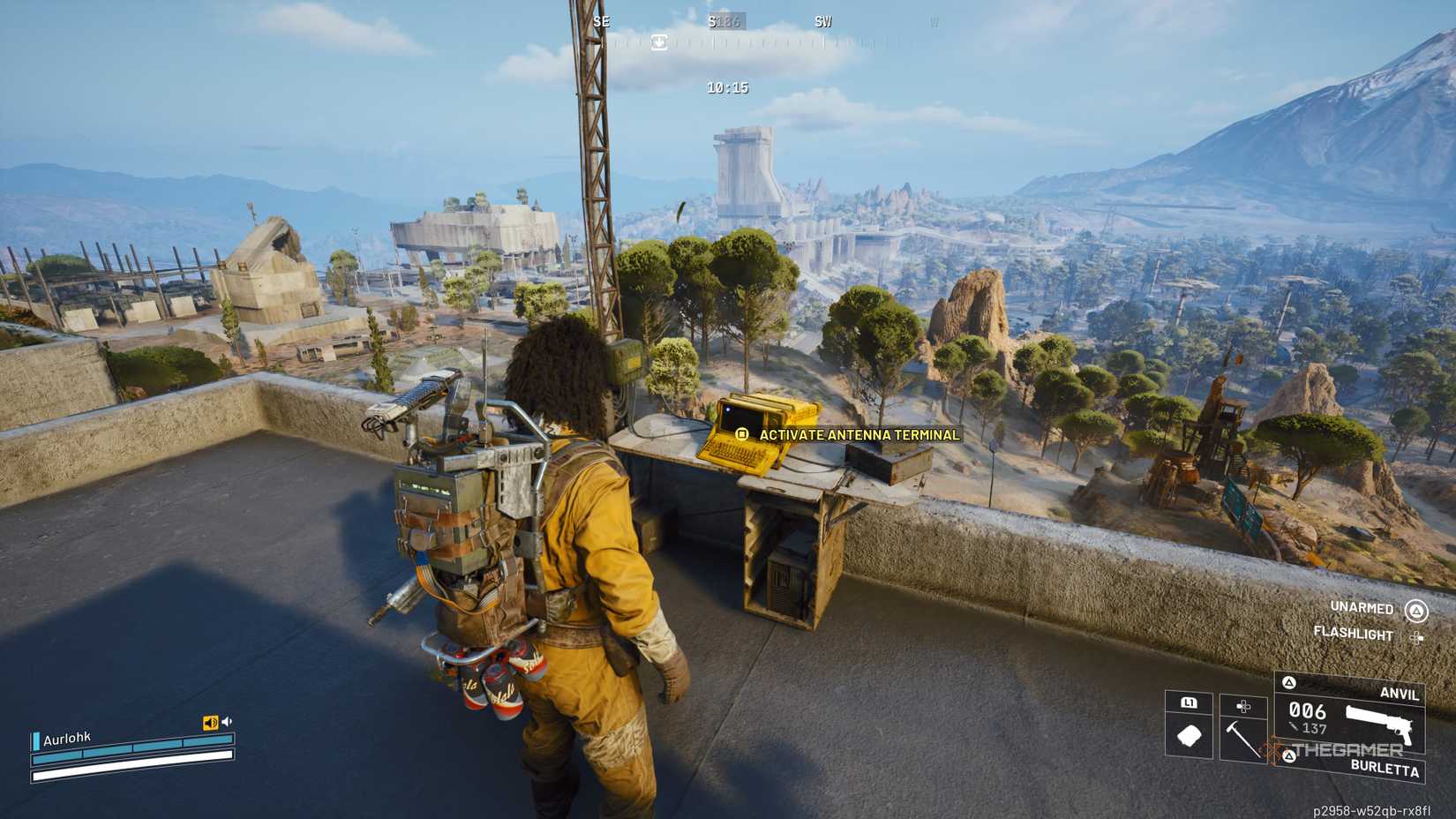 Player raider standing next to a small computer on a desk next to an antennae on the roof of the Pattern House in Arc Raiders.