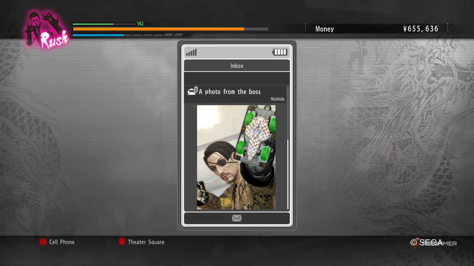 A text message showing Majima holding a Pocket Circuit Racer car in Yakuza Kiwami.