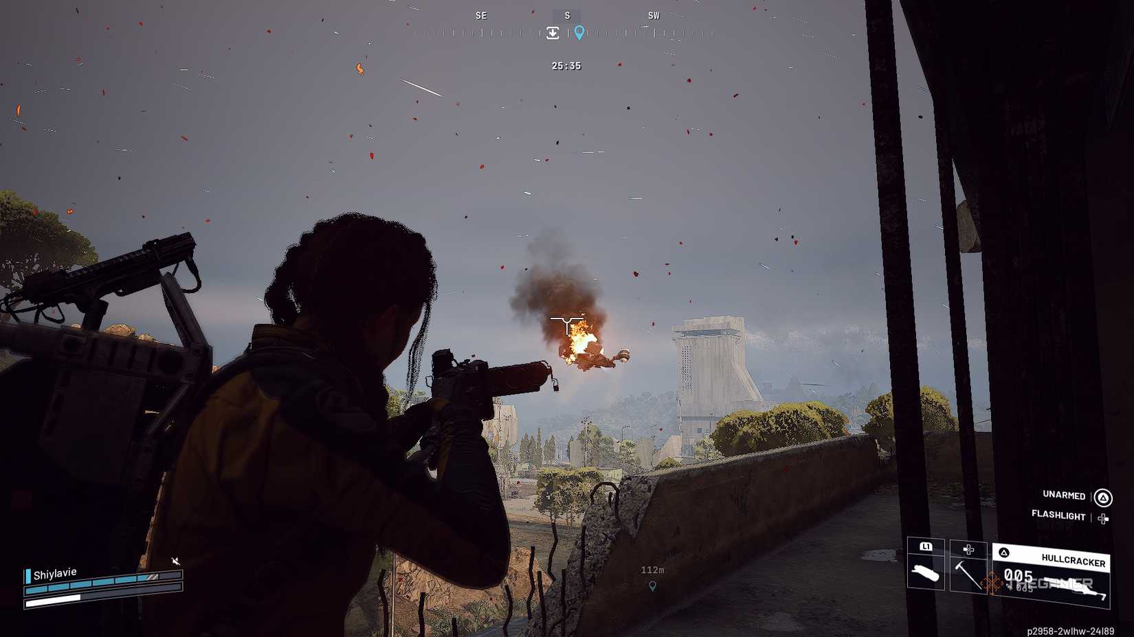 ARC Raiders attacking a Rocketeer in flames.